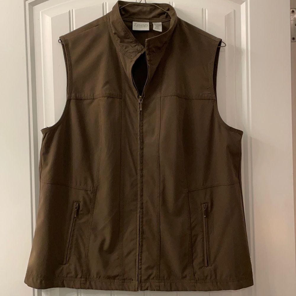 Zenergy vest by Chico’s.  2 zipper pockets No stains Gently worn